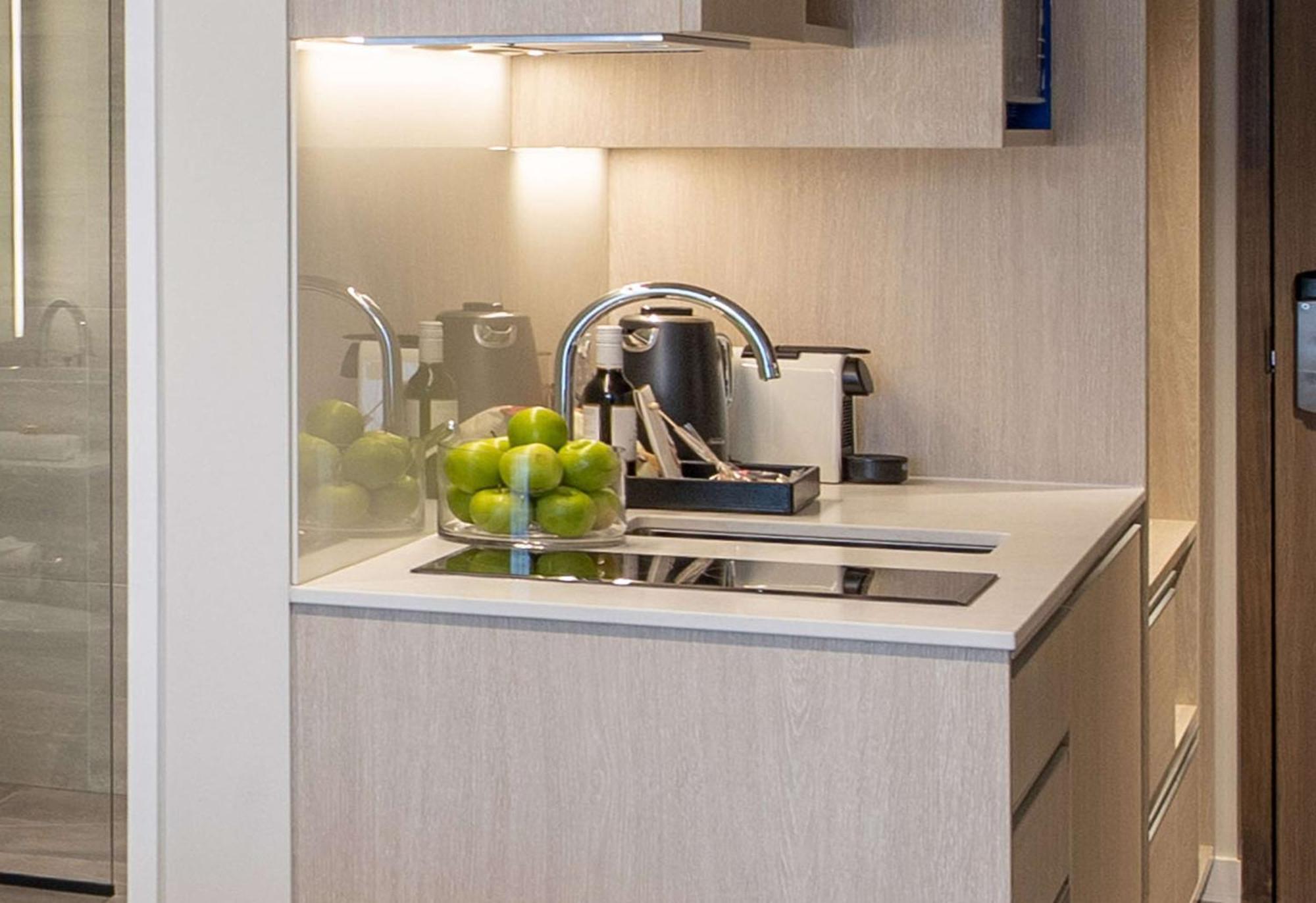 Sudima Christchurch City Kültér fotó A kitchen in a serviced apartment
